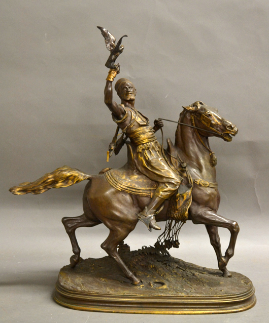 Pierre-Jules Mene (French, 1810-1879), ‘Arab Falconer,’ patinated bronze sculpture, signed ‘PJ Mene,’ 31 inches high by 28 inches wide. Sterling Associates image 